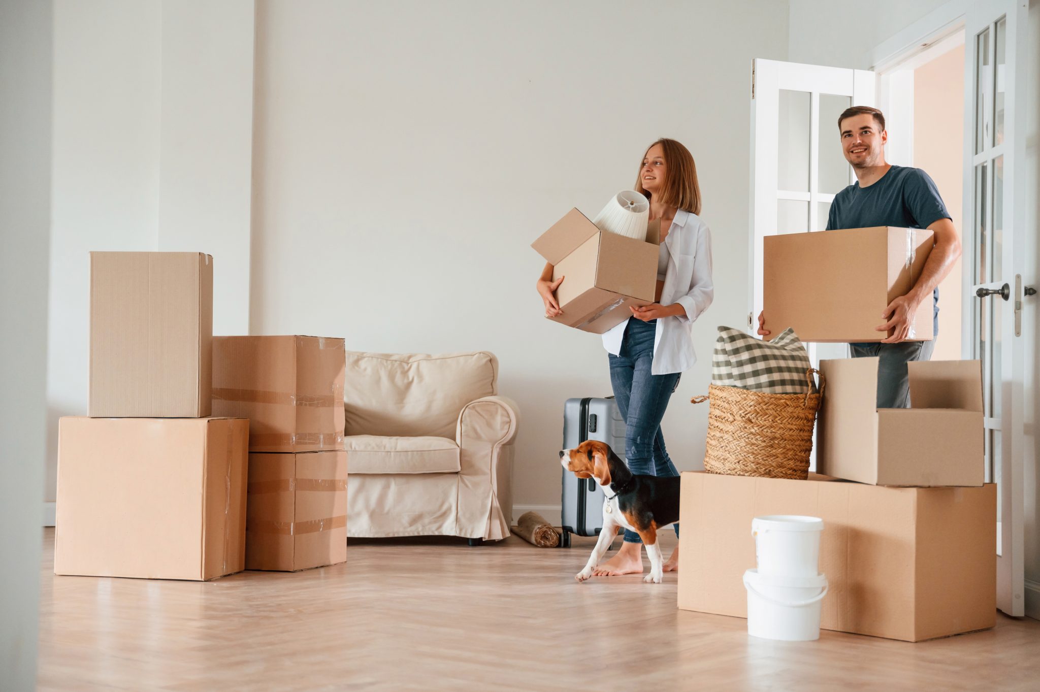 couple moving with boxes